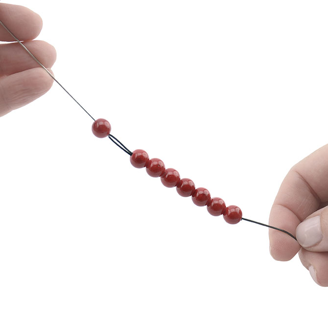 stringing beads on elastic cord